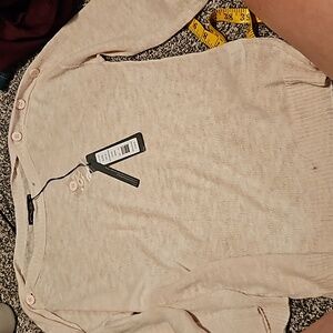 Michael Stans. Light pink top. 3/4 sleeves. New with tags. Women's size XS